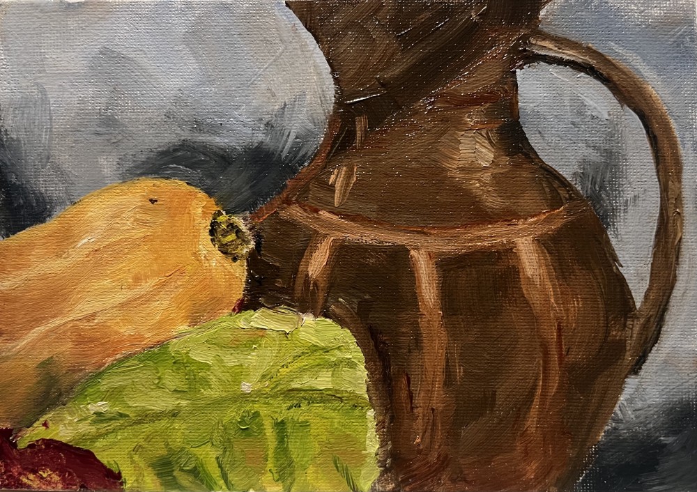 A pot, a squash and a cabbage